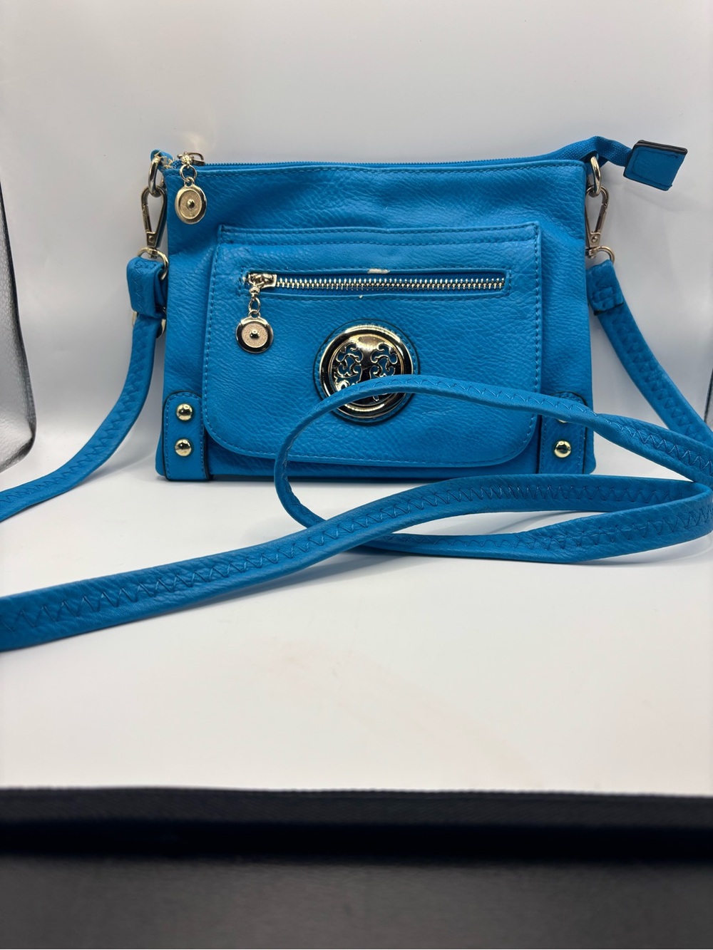 Bright Turquoise Crossbody Bag with Gold Accents